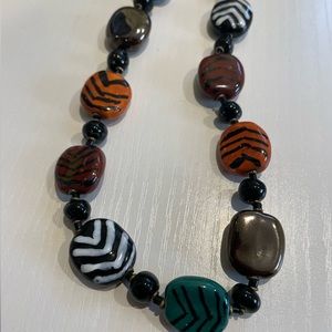 Beautiful unique multi color large beaded necklace. Stripes, solid beads